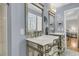 Charming bathroom features double sink vanity, marble countertop, and modern fixtures at 1406 Glencoe Dr, Mount Pleasant, SC 29464