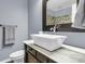 Elegant bathroom features a vessel sink, marble countertop, and decorative accents at 1406 Glencoe Dr, Mount Pleasant, SC 29464