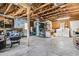 Spacious garage featuring a washer, dryer, workbench, and ample storage at 1406 Glencoe Dr, Mount Pleasant, SC 29464