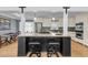 A stylish kitchen island with seating and stainless steel appliances at 1406 Glencoe Dr, Mount Pleasant, SC 29464