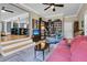 Relaxing living room and library with comfortable seating and a stylish design at 1406 Glencoe Dr, Mount Pleasant, SC 29464