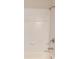 Neutral bathroom featuring white tile and a showerhead at 1445 Lettered Olive Ln, Mount Pleasant, SC 29464