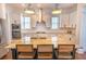 Modern kitchen features stainless steel appliances, granite countertops, and ample cabinet space at 1445 Lettered Olive Ln, Mount Pleasant, SC 29464