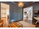 Open-concept living room offering seamless access to the kitchen, living room, and staircase at 1445 Lettered Olive Ln, Mount Pleasant, SC 29464