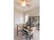 Office with a desk, ceiling fan, shelving unit, natural light, and neutral carpet at 1445 Lettered Olive Ln, Mount Pleasant, SC 29464