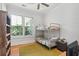 Bunk bed and window offer a ' bedroom with light and a bookshelf at 1474 Indian St, Mount Pleasant, SC 29464