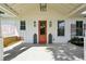 Welcoming front porch with a swing and stylish decor at 1474 Indian St, Mount Pleasant, SC 29464