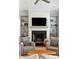 Inviting living room with a cozy fireplace, built-in shelving and comfortable seating at 1474 Indian St, Mount Pleasant, SC 29464