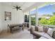 Relaxing screened porch with table, seating, and views of lush backyard at 1474 Indian St, Mount Pleasant, SC 29464