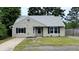 Charming single-story home with a well-manicured lawn and a classic design at 148 Lancashire Rd, Summerville, SC 29486