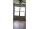 Bright room with windows providing a view of the backyard at 148 Lancashire Rd, Summerville, SC 29486
