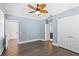 Light-filled bedroom with hardwood floors and access to an ensuite bath at 176 Clearblue Loop, Summerville, SC 29486