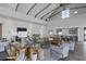 A modern clubhouse lounge area with high ceilings, stylish furniture, and ample seating, ideal for socializing at 176 Clearblue Loop, Summerville, SC 29486