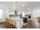 Spacious kitchen with white cabinets, granite countertops, and a large island at 176 Clearblue Loop, Summerville, SC 29486