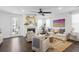 Cozy living room with a fireplace and stylish decor, offering a comfortable and inviting atmosphere for relaxation at 176 Clearblue Loop, Summerville, SC 29486