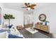 Inviting living room with hardwood floors, ceiling fan, and stylish decor at 176 Clearblue Loop, Summerville, SC 29486