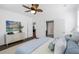 Stylish primary bedroom with an ensuite bathroom and ample natural light, creating a peaceful and inviting retreat at 176 Clearblue Loop, Summerville, SC 29486