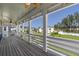 Enjoy scenic views from this charming covered front porch at 176 Clearblue Loop, Summerville, SC 29486