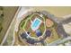 Aerial view of the community pool, playground, parking and putting green surrounded by native landscaping at 184 Grange Cir, Summerville, SC 29486