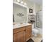 Well-lit bathroom with a wood vanity, shower over tub, and a functional layout for everyday use at 2014 Basildon Rd, Mount Pleasant, SC 29466