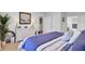 Bedroom featuring a patterned bed, white dresser, a plant, and closet with sliding doors at 2014 Basildon Rd, Mount Pleasant, SC 29466