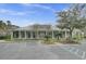 Inviting clubhouse with a covered porch, ample parking, and meticulously maintained landscaping for community enjoyment at 2014 Basildon Rd, Mount Pleasant, SC 29466