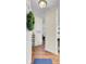 Foyer featuring hardwood floors, a wreath, and an open view into the living room at 2014 Basildon Rd, Mount Pleasant, SC 29466