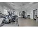 Community gym with treadmills, elliptical machines, weightlifting station, rubber floor, and ceiling fans at 2014 Basildon Rd, Mount Pleasant, SC 29466