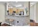Kitchen with breakfast bar, wood cabinets, stainless steel appliances, and modern decor at 2014 Basildon Rd, Mount Pleasant, SC 29466