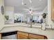 Kitchen featuring light countertops with a view to the living and dining spaces at 2014 Basildon Rd, Mount Pleasant, SC 29466