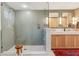 Beautiful bathroom with a glass shower, marble floors, modern fixtures and a double sink vanity at 2158 Westrivers Rd, Charleston, SC 29412
