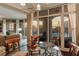 Charming dining area offers a stylish light fixture and lots of natural light at 222 S Plaza Ct, Mount Pleasant, SC 29464