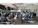 Well-equipped gym offering a range of cardio machines, mirrored walls, and ceiling fans for comfort at 222 S Plaza Ct, Mount Pleasant, SC 29464