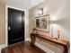 Entryway with an ornate side table, beautiful artwork, and stylish lighting at 222 S Plaza Ct, Mount Pleasant, SC 29464