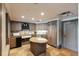 Kitchen features custom cabinets, island, and unique sink at 222 S Plaza Ct, Mount Pleasant, SC 29464