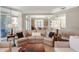 Sun-filled living room features comfortable seating and an open layout, perfect for entertaining at 222 S Plaza Ct, Mount Pleasant, SC 29464