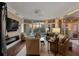 A spacious living room has a fireplace, ample seating, and a beautiful view at 222 S Plaza Ct, Mount Pleasant, SC 29464