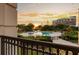Amazing sunset over the community pool, viewed from the upper balcony at 222 S Plaza Ct, Mount Pleasant, SC 29464