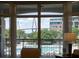 View from inside the condo showing pool and bridge at 222 S Plaza Ct, Mount Pleasant, SC 29464