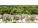 Charming suburban homes nestled amongst lush green trees in a quiet neighborhood at 2254 Show Basket Way, Mount Pleasant, SC 29466