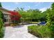 Back patio with trees and seating offers a comfortable place to relax outdoors at 2254 Show Basket Way, Mount Pleasant, SC 29466