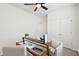 Bright bedroom featuring a stylish glass-top desk, comfortable seating, and ceiling fan at 2254 Show Basket Way, Mount Pleasant, SC 29466