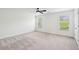 Bright and airy bedroom with neutral carpet and two large windows at 2254 Show Basket Way, Mount Pleasant, SC 29466