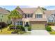 Beautiful two-story home with stone accents, well-manicured landscaping, and a two-car garage at 2254 Show Basket Way, Mount Pleasant, SC 29466