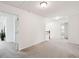 Open hallway with staircase, neutral paint, plush carpeting, and natural light at 2254 Show Basket Way, Mount Pleasant, SC 29466