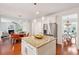 Open kitchen island with granite countertops, stainless steel appliances, and convenient dining area access at 2254 Show Basket Way, Mount Pleasant, SC 29466