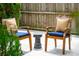 A cozy seating area with comfortable cushioned chairs and a rustic metal table at 2254 Show Basket Way, Mount Pleasant, SC 29466