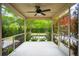 Cozy screened porch offers a tranquil outdoor space with views of the well-maintained backyard at 2254 Show Basket Way, Mount Pleasant, SC 29466
