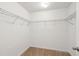 Carpeted walk-in closet featuring white walls and sturdy wire shelving at 2254 Show Basket Way, Mount Pleasant, SC 29466