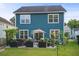 Relaxing backyard with a patio, hot tub, and well-manicured lawn, perfect for outdoor enjoyment at 2324 Town Woods Rd, Charleston, SC 29414